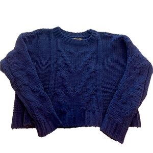 Thick, cable-knit sweater (PacSun)